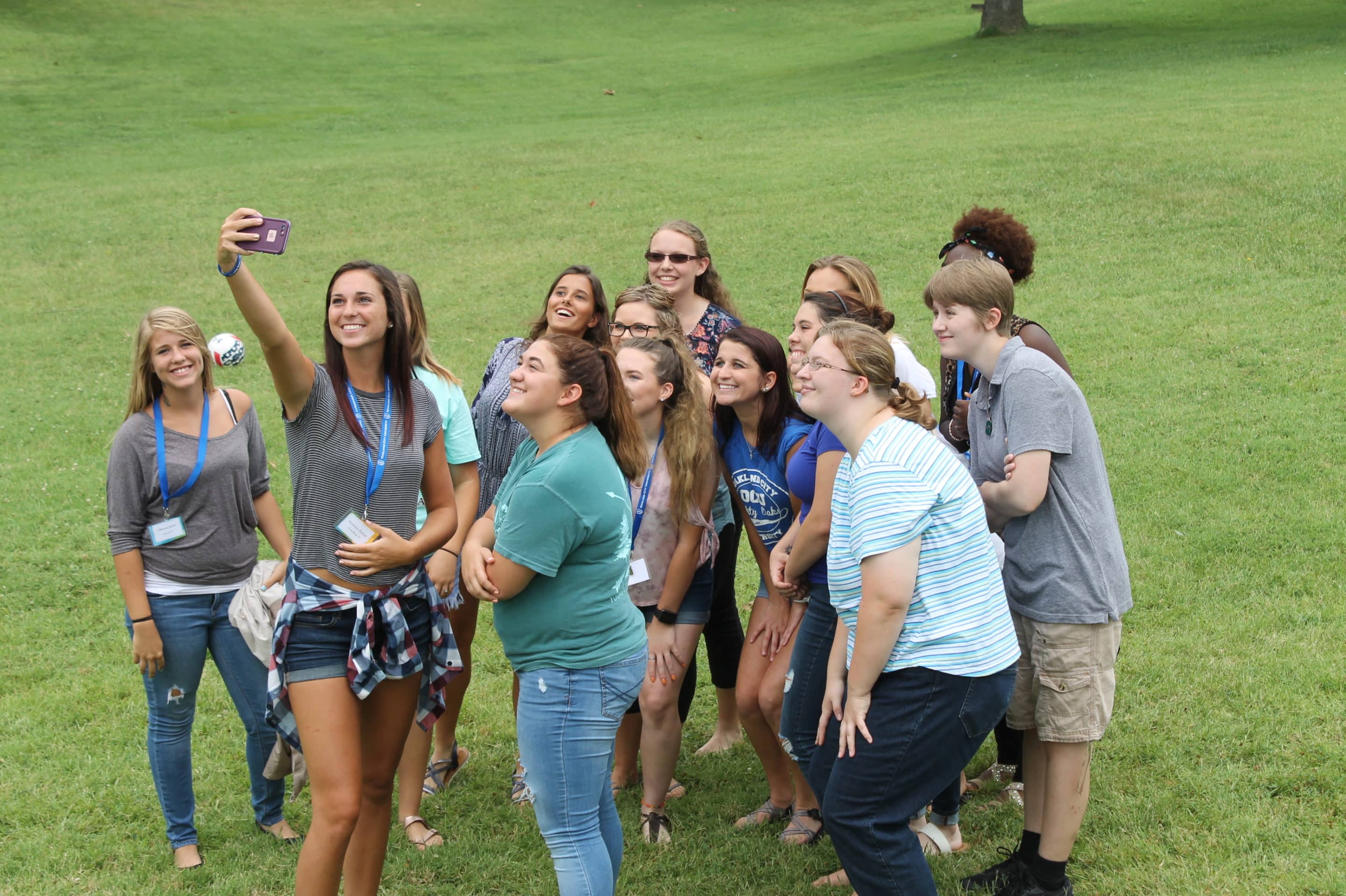students taking selfie
